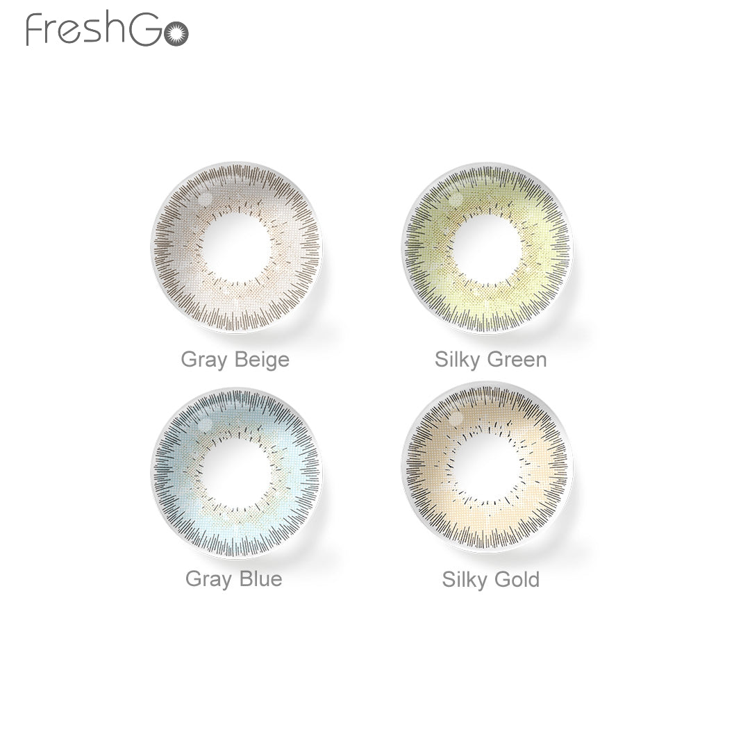 Array of Bellalens contact lenses in a white case, showcasing 4 colors: Gray Beige, Gray blue, Silky Green, Silky Gold. Each lens is labeled with its color name beneath the case.