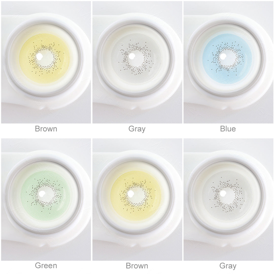 Array of BeNatural contact lenses in a white case, showcasing five colors:Brown,Gray,Blue,Green. Each lens is labeled with its color name beneath the case.