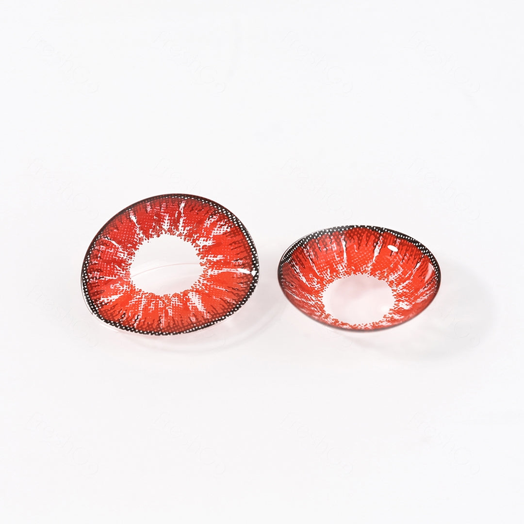 2 pcs lenses of Nonno contact lenses on a white surface, showing the details of the lens pattern from the front and back