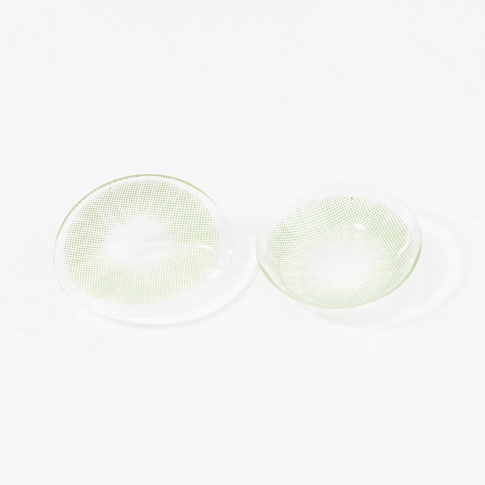 2 pcs lenses of RIO contact lenses on a white surface, showing the details of the lens pattern from the front and back