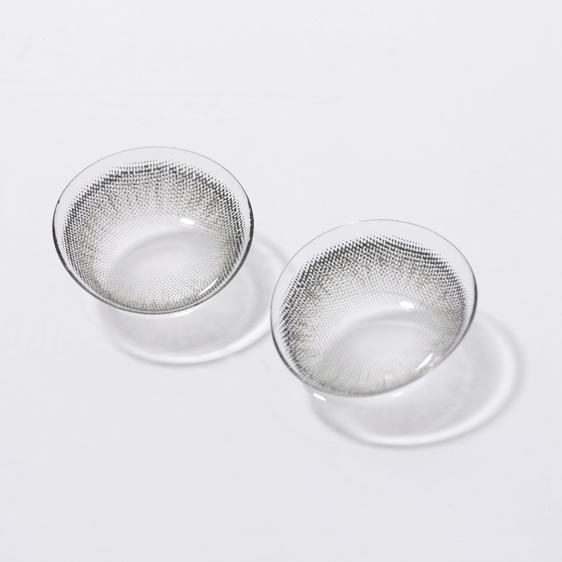 A display of Bunny colored contacts in /Cadet Gray,  shown  as a lens in a close-up of a real  picture.