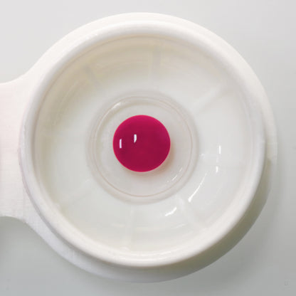 Color Blind Lens- F4 Red, showed in a white case.