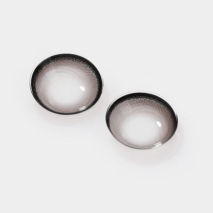 2 pcs lenses of Jupiter contact lenses on a white surface, showing the details of the lens pattern from the front and back
