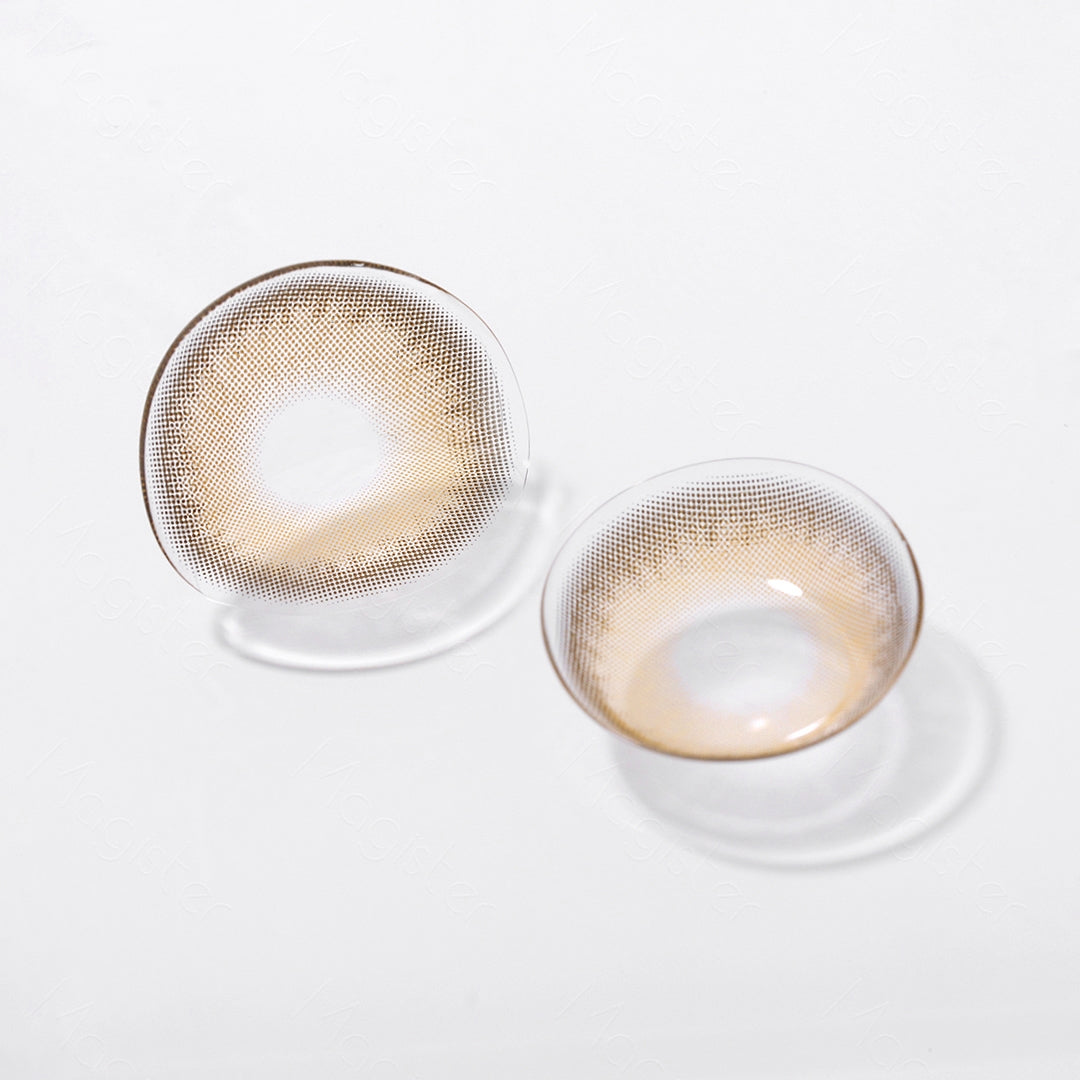 Two lenses of Russo contact lenses on a white surface, showing the details of the lens pattern from the front and back