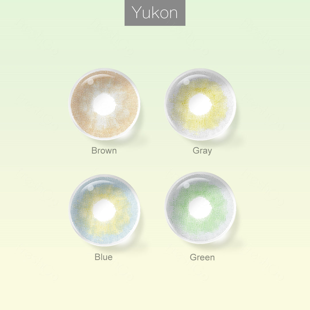Grid layout of YUKON colored contact lenses in various shades with each lens' color name: Brown, Gray, Blue and Green, on a soft gradient background.