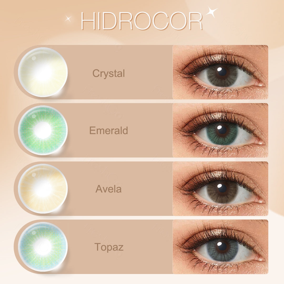 Selection of Hidrocor colored contact lenses presented in shades of Crystal, Emerald, Avela, and Topaz, each displayed with an eye close-up showing the lens effect on the iris, and a swatch of the lens design next to the color name.