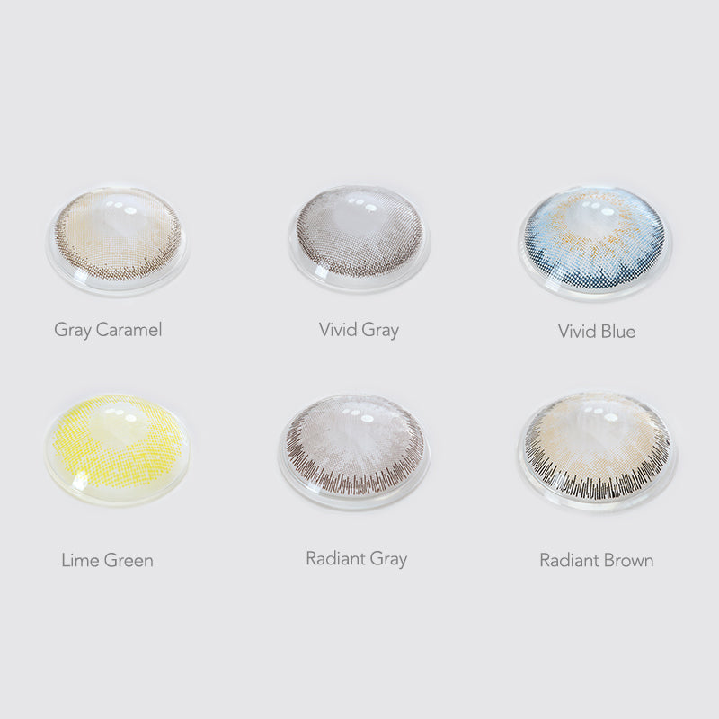 Array of GLOW contact lenses in a white case, showcasing 4 colors: Gray Caramel, Vivid Gray, Vivid Blue,Lime Green, Radiant Gray, Radiant Brown . Each lens is labeled with its color name beneath the case.