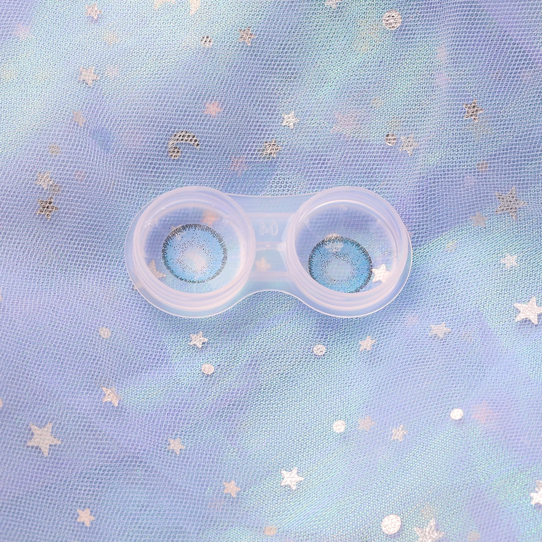 The transparent contact lenses case displays the visual impact of blue-colored contact lenses, providing a clear illustration of the lenses within the case.
