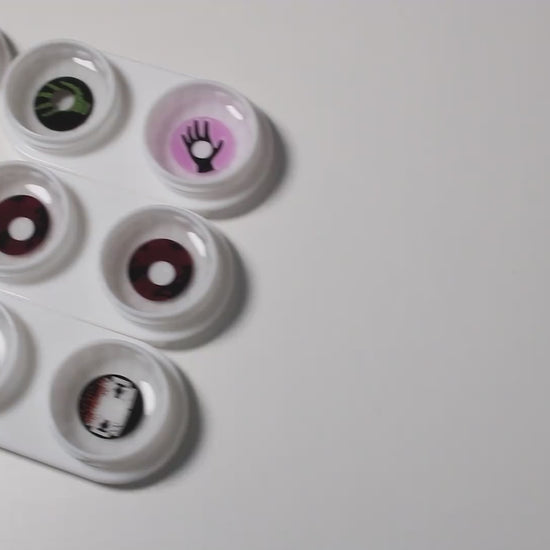 Product video presenting a range of Scary Costume Contacts, featuring close-up views of the lenses in various shades and demonstrating how they appear when applied to the eyes.